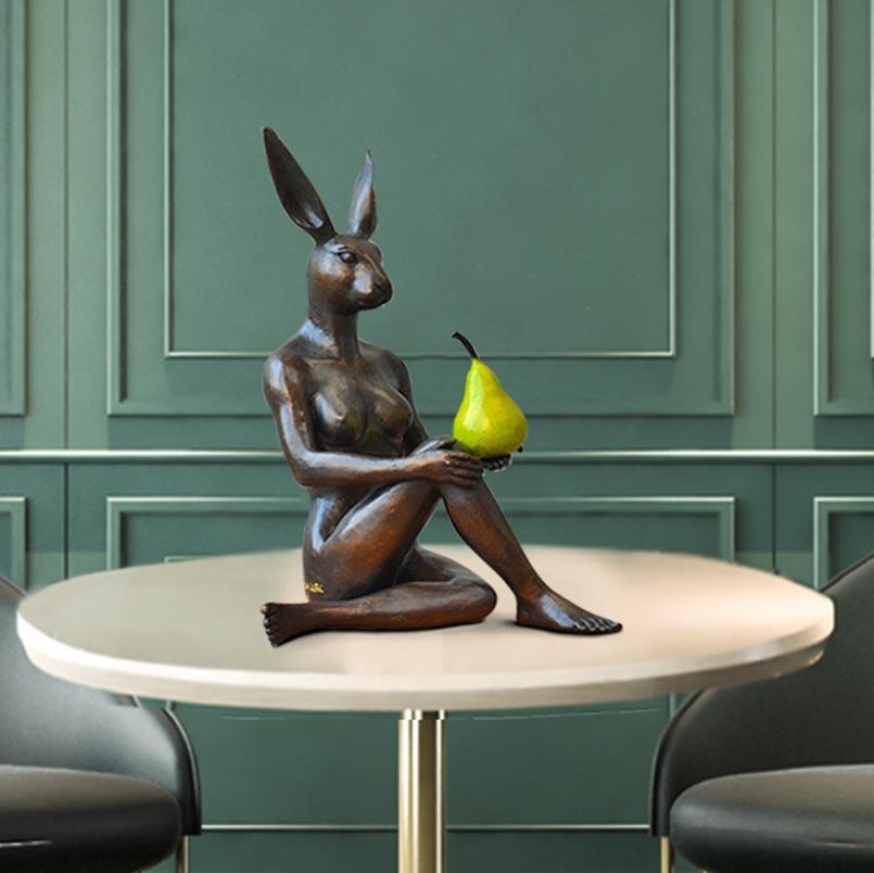 Gillie and Marc,Rabbitwoman grew a pear, Bronze with green Patina- Limited Edition #14/25 sculpture