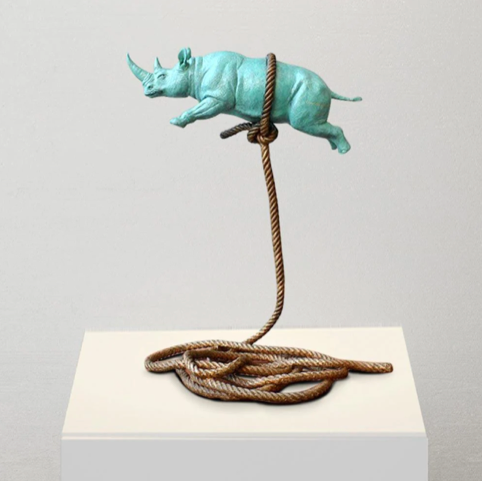 Green Flying Rhino on a Short Rope - a sculpture by Gillie and