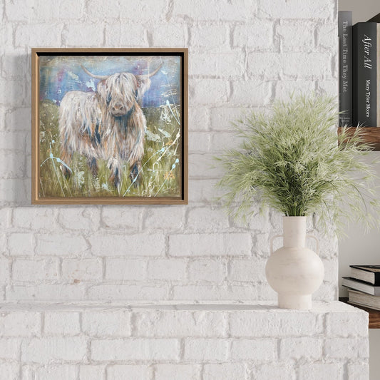 Highland cows standing in long grass, painted in soft pastel colours. In situ on a white brick wall.