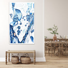 Load image into Gallery viewer, Abstract oil painting on a white background in blue and aqua. In situ on a beige dividing wall.
