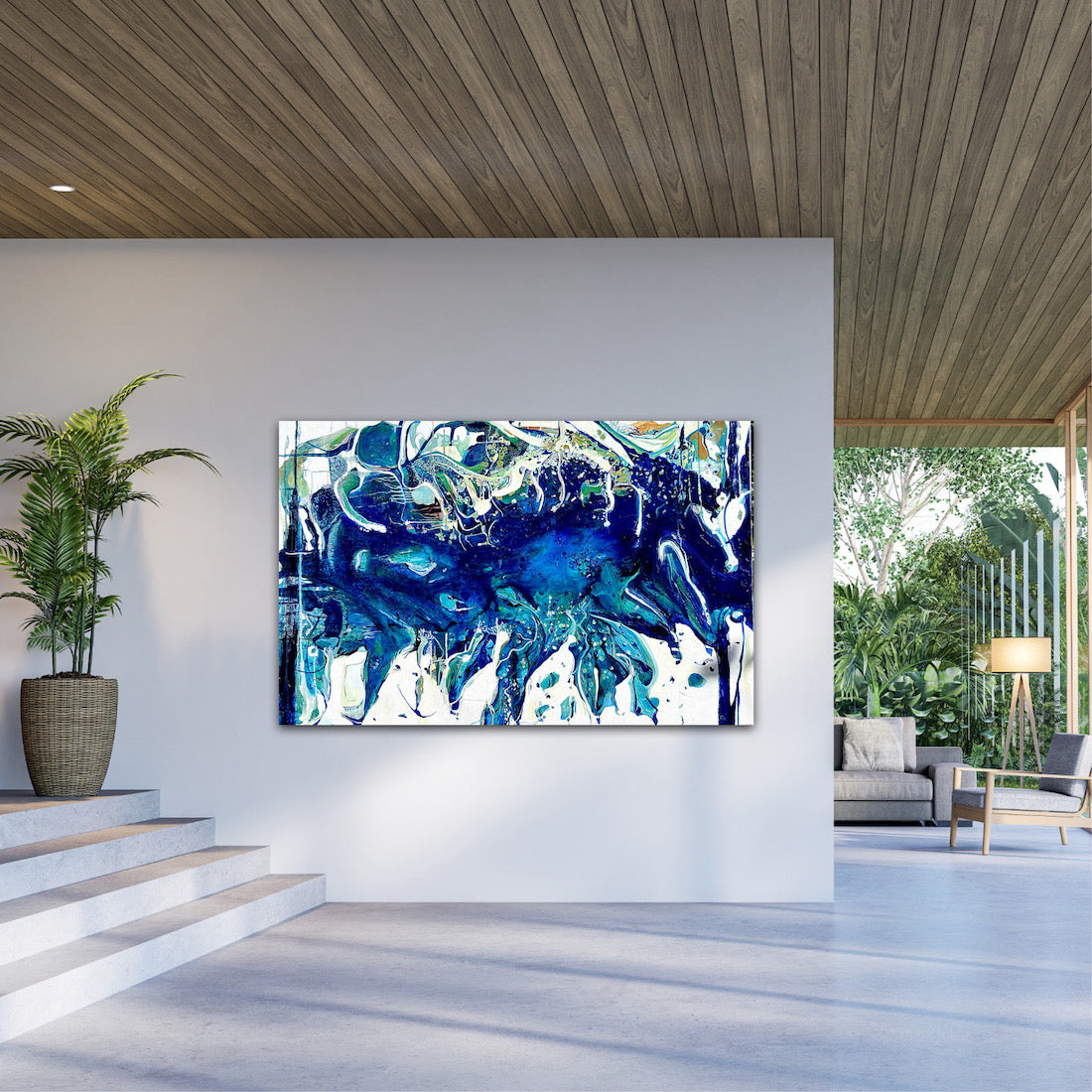 Abstract oil painting on a white background in shades of blue, white and green, on a dividing wall.