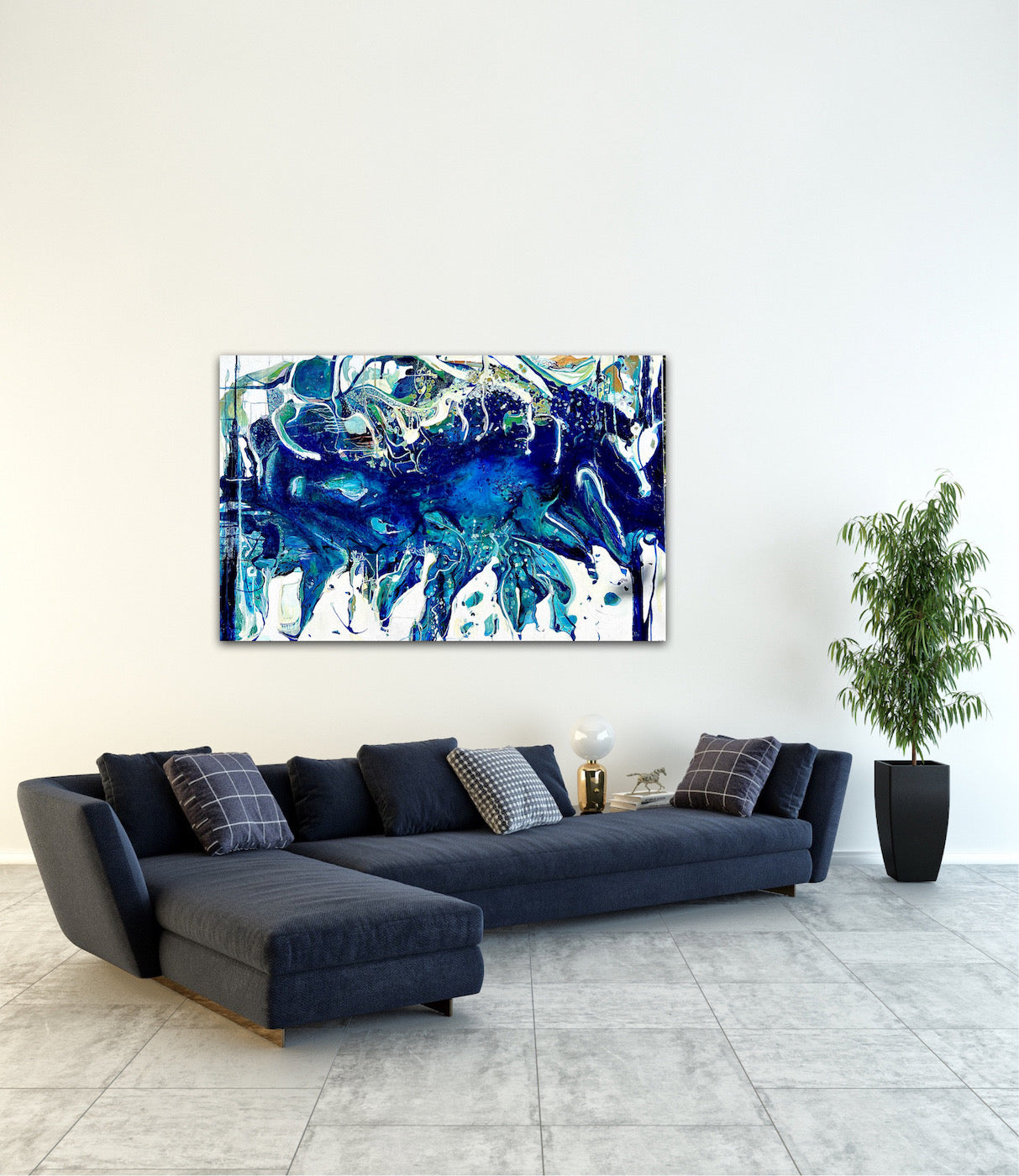 Abstract oil painting on a white background in shades of blue, white and green on a white wall.
