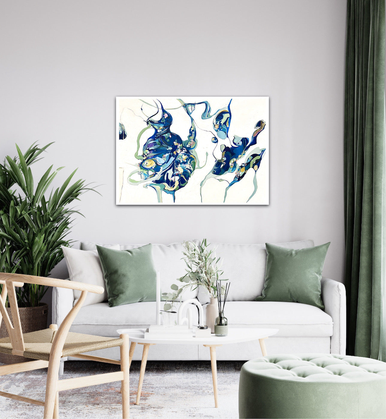 Oil painting on a white background with two abstract shapes in shades of blue and green on living room wall.