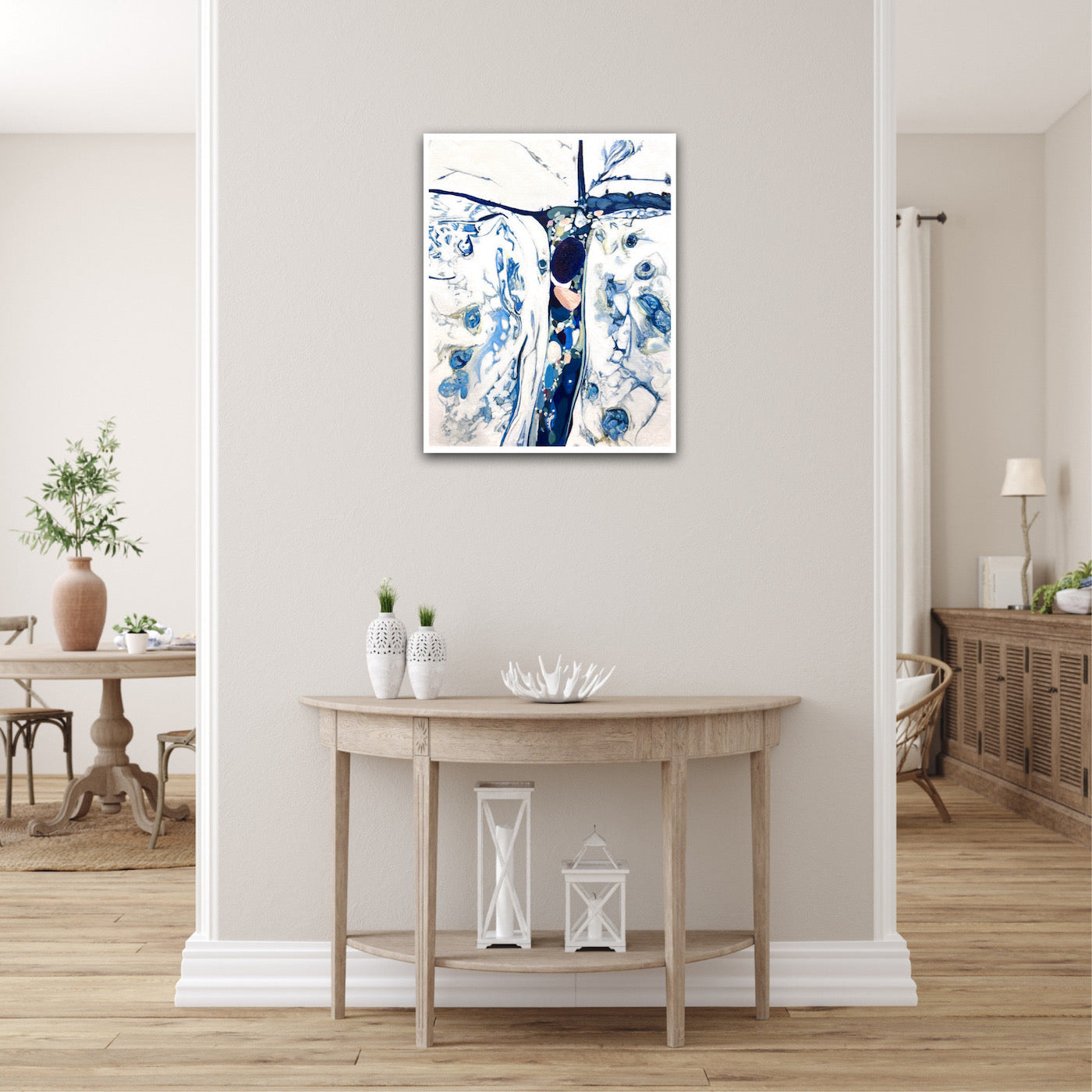 Abstract oil painting on a white background in shades of blue. Shown on a dividing wall.