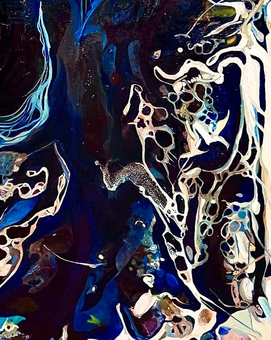 Abstract oil and mixed medium painting in shades of dark blue, royal blue and multicoloured detail. Close up view.