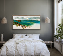 Load image into Gallery viewer, Ocean, sand and rocks in turquoise, aqua and white and browns, painted in an abstract style. In situ on a bedroom wall.
