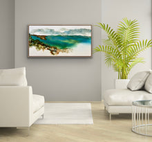 Load image into Gallery viewer, Ocean, sand and rocks in turquoise, aqua and white and browns, painted in an abstract style. In situ on a grey wall.
