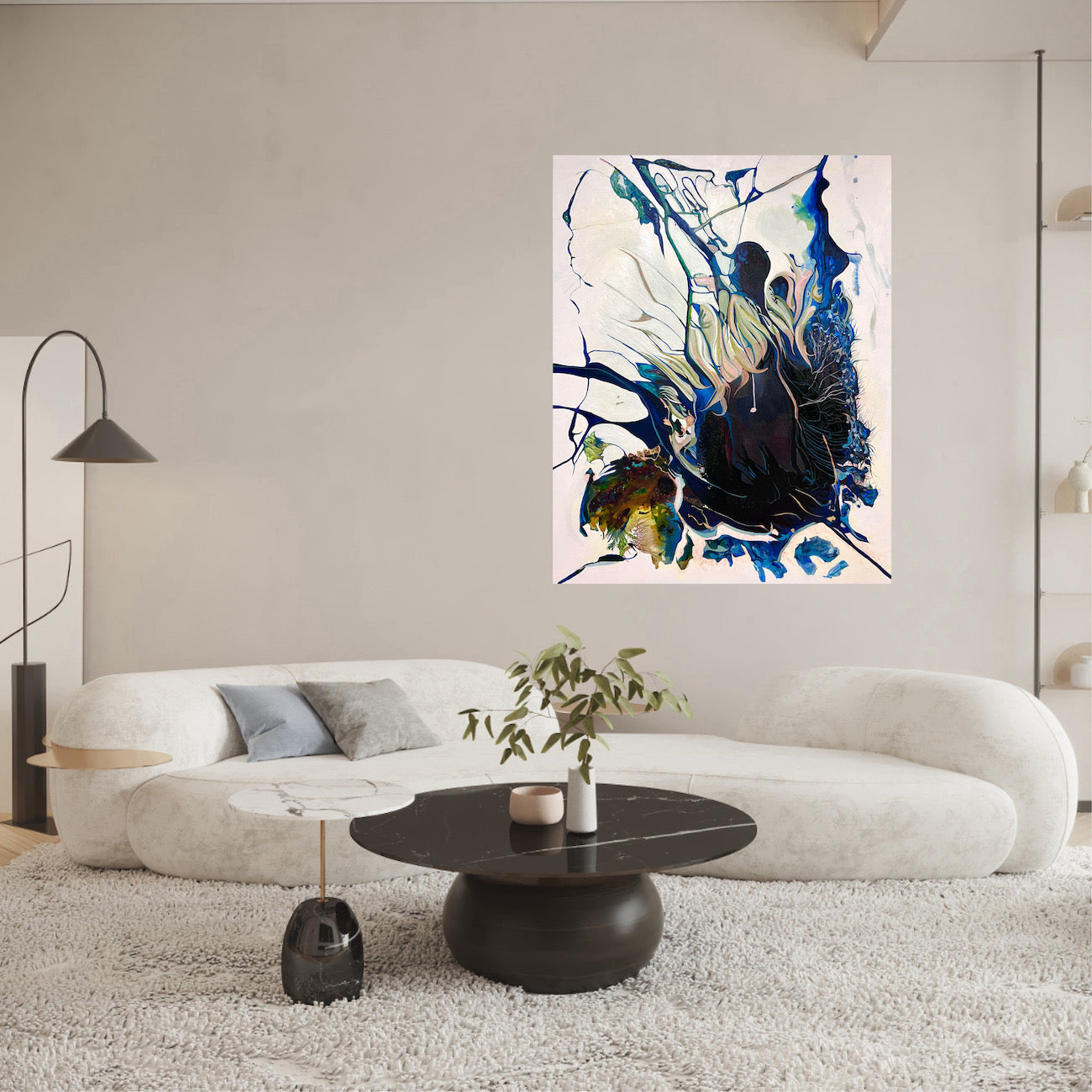 Abstract oil and mixed medium painting on an off-white background in dominant shades of Navy, royal blue and lighter blue. Shown on a beige wall.