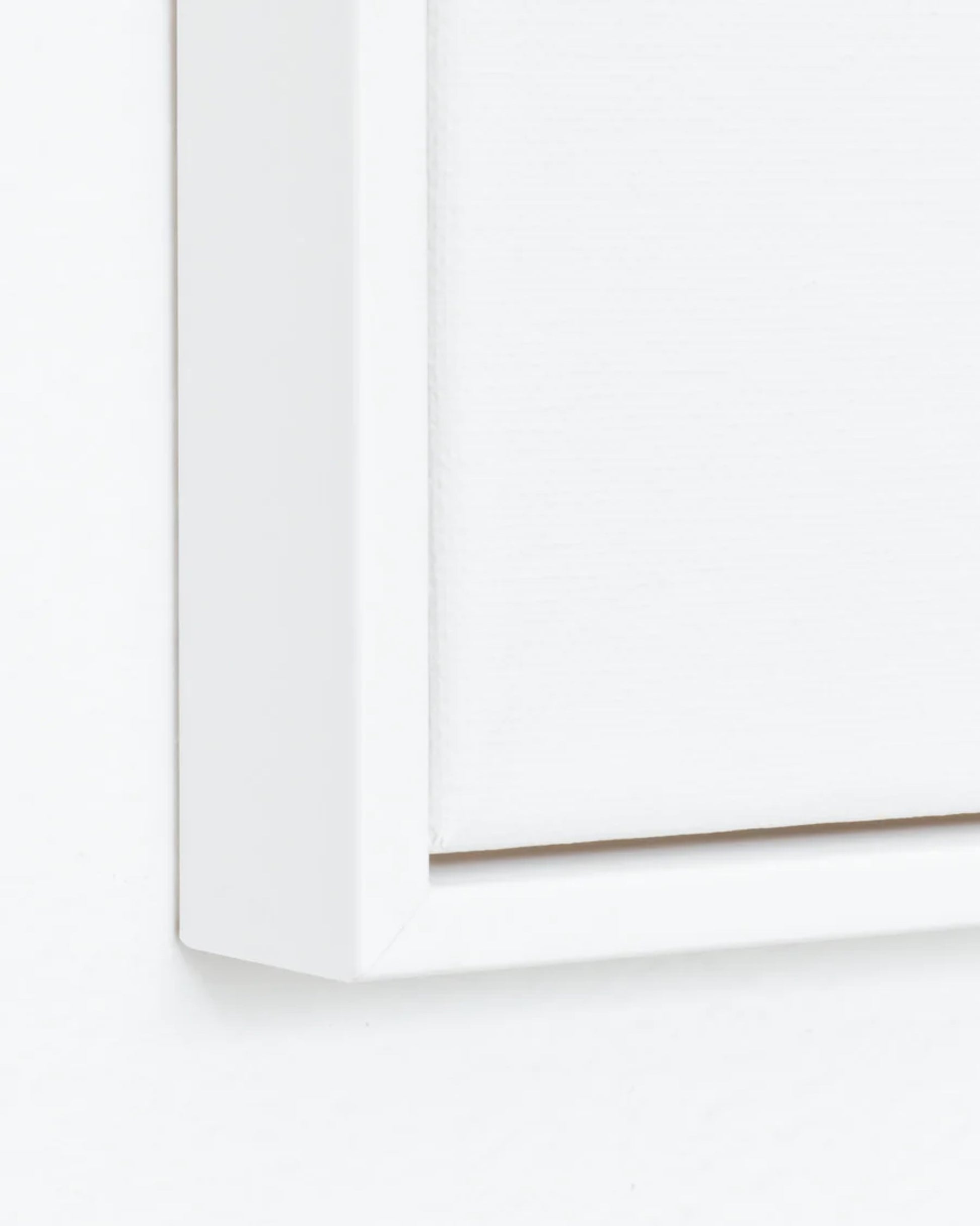 White timber floating frame.