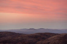 Load image into Gallery viewer, A soft alpine sunrise dusts the rolling peaks of 
Kosciuszko National Park, Australia
