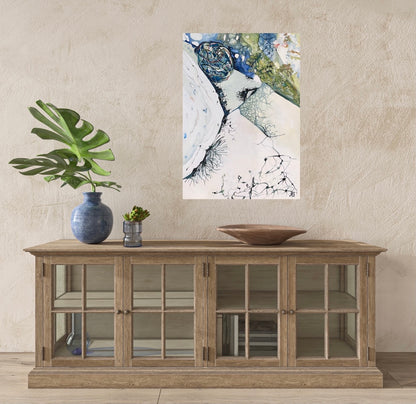Abstract painting in shades of white, blue and green. Shown in situ on a beige wall.