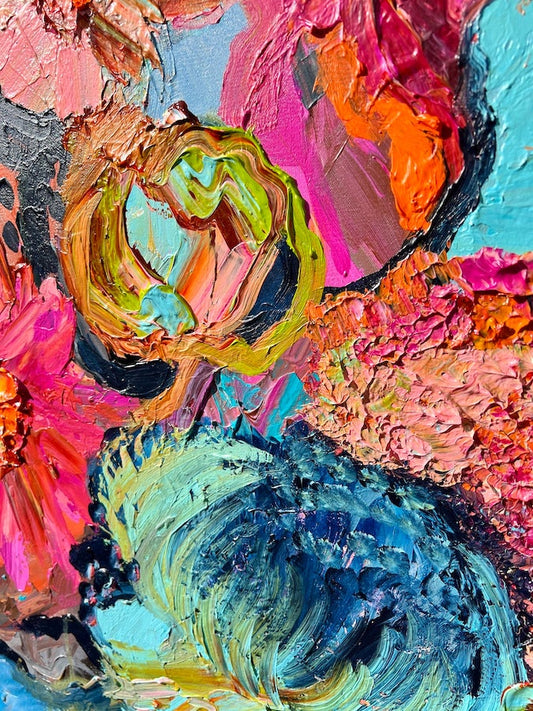 Pink and blue blooms on a bright blue background. Detail view 2.