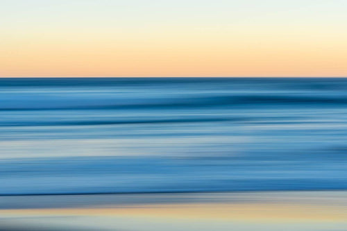 Cool ocean tones contrast with the peachy 
pre-dawn glow. South Coast, Australia