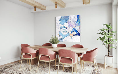 Abstract rock pool painting in shades of blue, white aqua turquoise and mauve.  Shown in situ on a dining room wall.