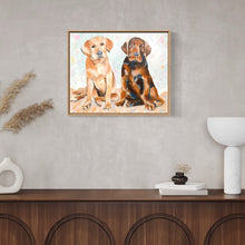 Load image into Gallery viewer, A cream Labrador and a brown Labrador standing side by side against a blue and beige pastel background. In situ on an off white wall above a timber sideboard.
