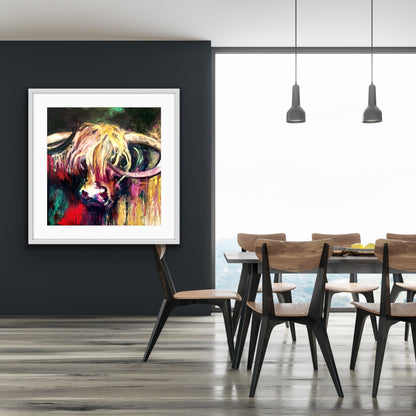 A lovely limited edition print of Curly the bull with his head against a background of emerald, red, gold, pink and black, in a white frame.