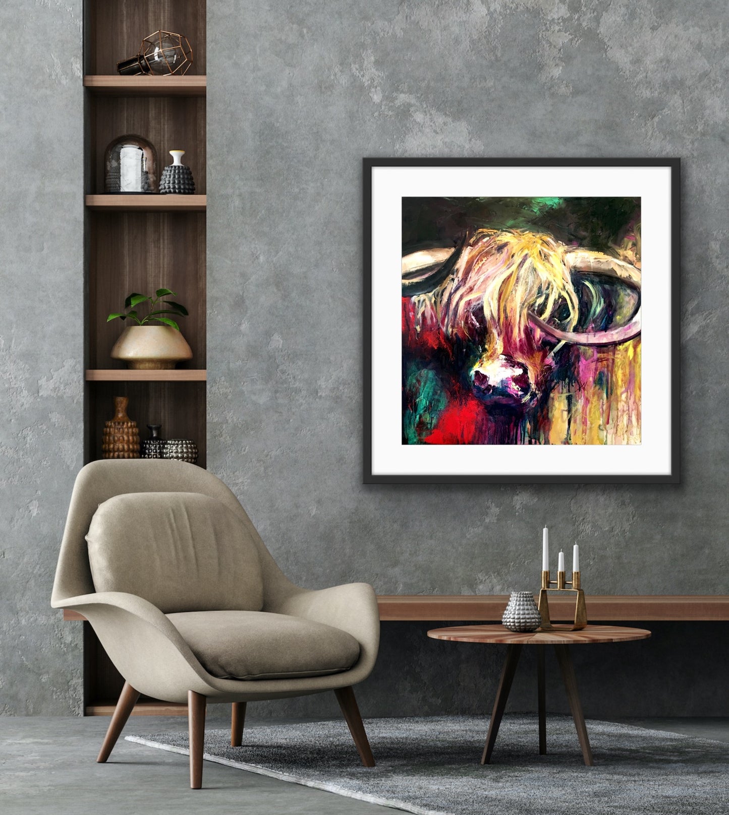 A lovely limited edition print of Curly the bull with his head against a background of emerald, red, gold, pink and black, in a black frame.