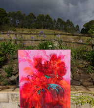 Load image into Gallery viewer, Big Bold and Beautiful, reds and pinks are present in this big showstopper, textured blooms. Shown in an outdoor setting.
