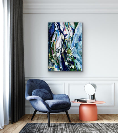 Contemporary abstract painting in shades of light blue, dark blue, turquoise, citrus, pink and white. Shown on a white sitting room wall.