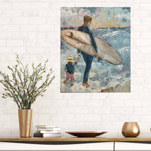 Load image into Gallery viewer, A father standing on the water&#39;s edge with a surfboard under his arm, holding his son&#39;s hand. Painting in muted colours. Shown here on a white brick wall.
