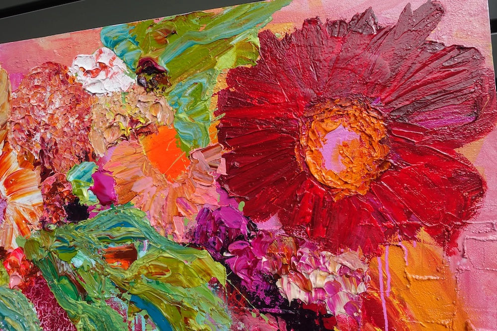 Multicoloured blooms against a hot pink background. Detail view 3.