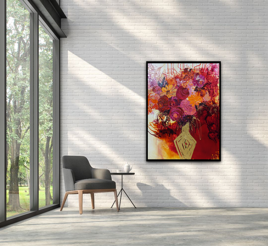 Gold vase with a mass of pink, red and orange blooms with red, gold and white background