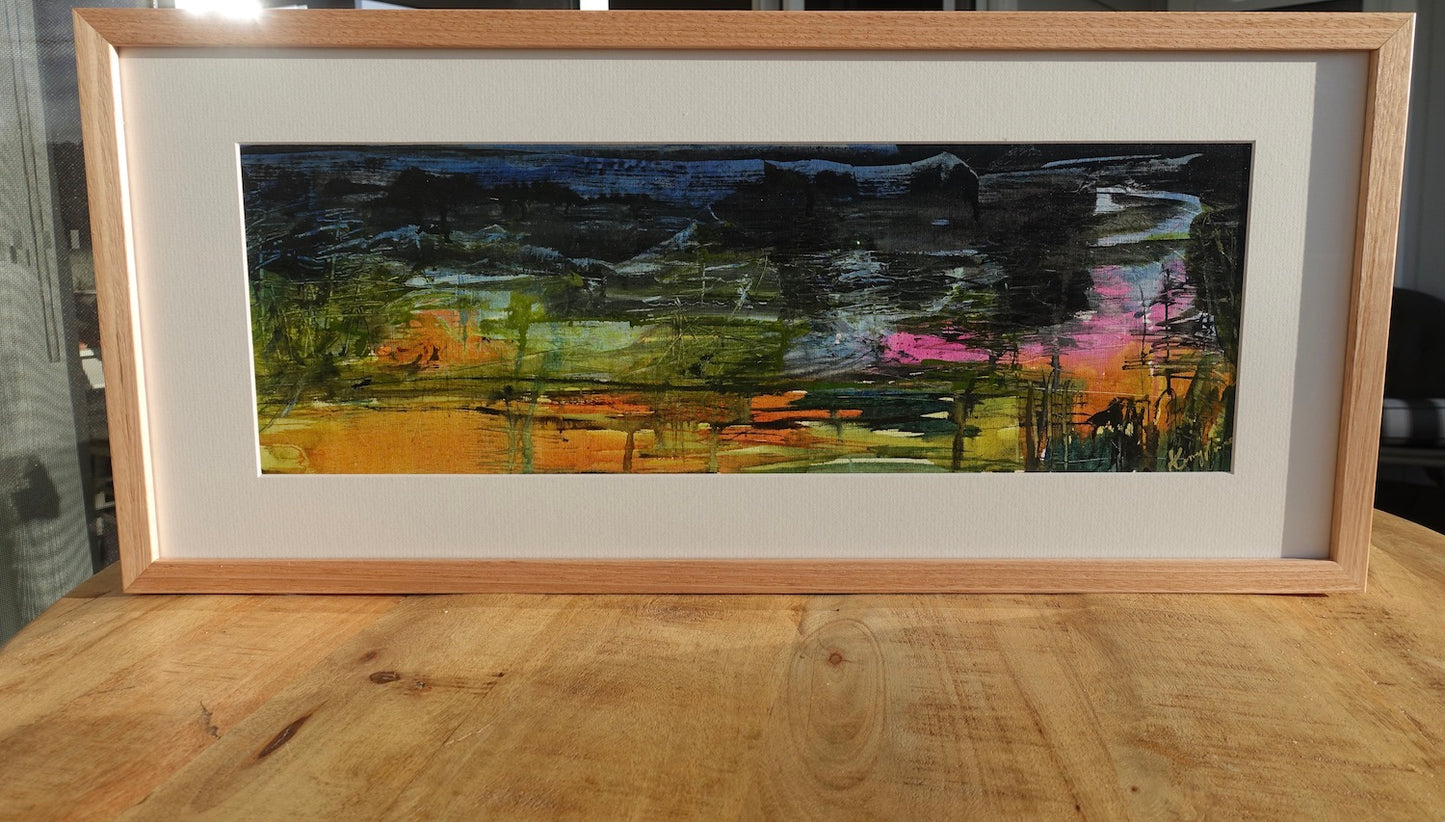 Kiama at sunset on the NSW South Coast painted in an abstract style. Framed view.
