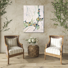 Load image into Gallery viewer, Abstract painting in shades of sea green and oyster white with small multicoloured pieces. In situ on a sitting room wall.
