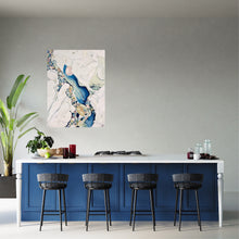 Load image into Gallery viewer, Abstract painting in shades of blue and oyster white with small multicoloured pieces. In situ on a grey wall.
