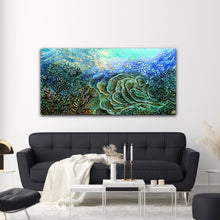 Load image into Gallery viewer, Painting of a reef in shades of turquoise, aqua, blue and yellow. Shown in situ on a white wall above a black sofa.
