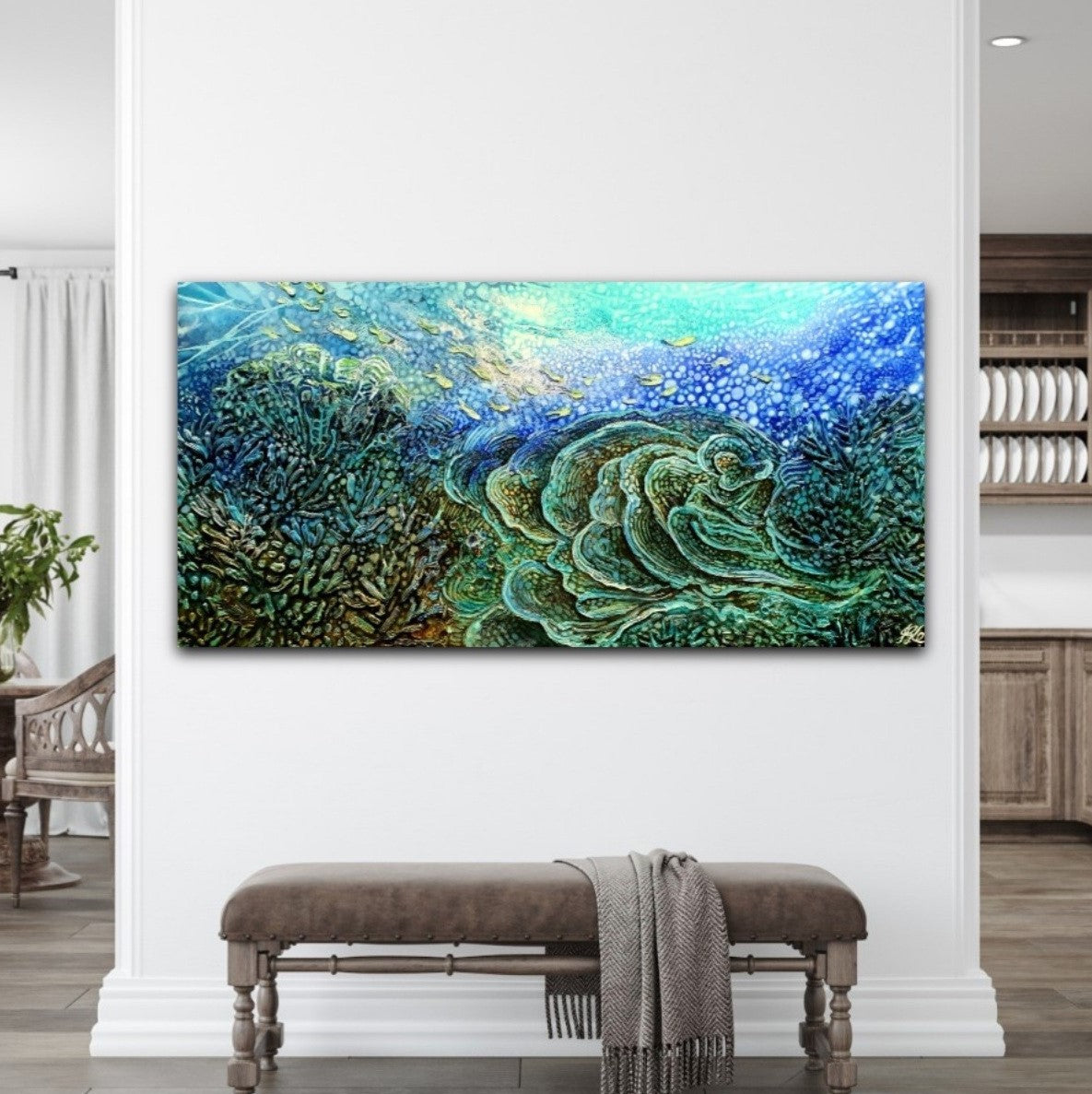 Original painting of an underwater reef with beautiful sea colours of blue and turquoise. Shown in situ on a white wall above a bench seat.