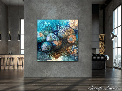 Rockpool shells in shades of turquoise, aqua and ochre. Shown in situ on a grey wall