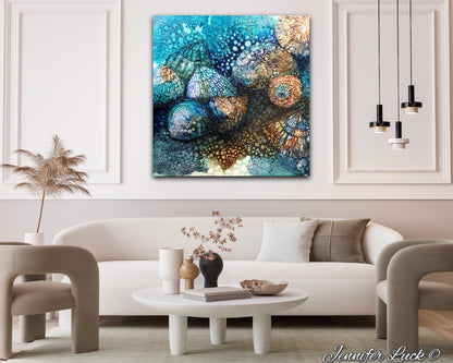 Rockpool shells in shades of turquoise, aqua and ochre. Shown in situ on a living room wall.
