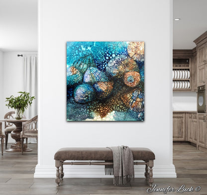 Rockpool shells in shades of turquoise, aqua and ochre. Shown on white wall.