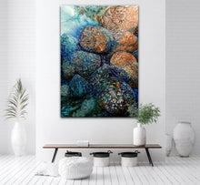 Load image into Gallery viewer, Moonlight shining underwater on periwinkles and rocks, painted in shades of blue, aqua, turquoise and ochre. In situ on a white wall.
