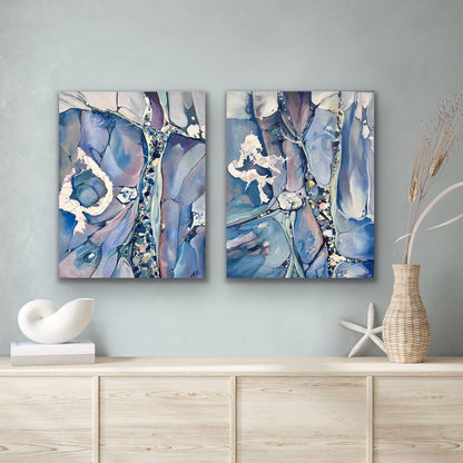 Abstract painting in shades of medium blue. In situ with matching artwork.