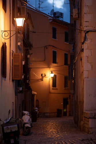 The warm, inviting glow of the charming streets 
on a summer’s evening. Rovinj, Croatia.  