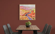 Load image into Gallery viewer, Ormiston Gorge in shades of pink, coral, orange and yellow, painted in an abstract expressionist style. In situ on an ochre dining room wall.
