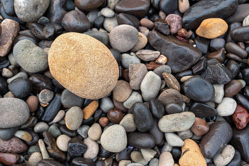 The ceaseless motion of the wind and the ocean
shapes these pebbles. South Coast, Australia 