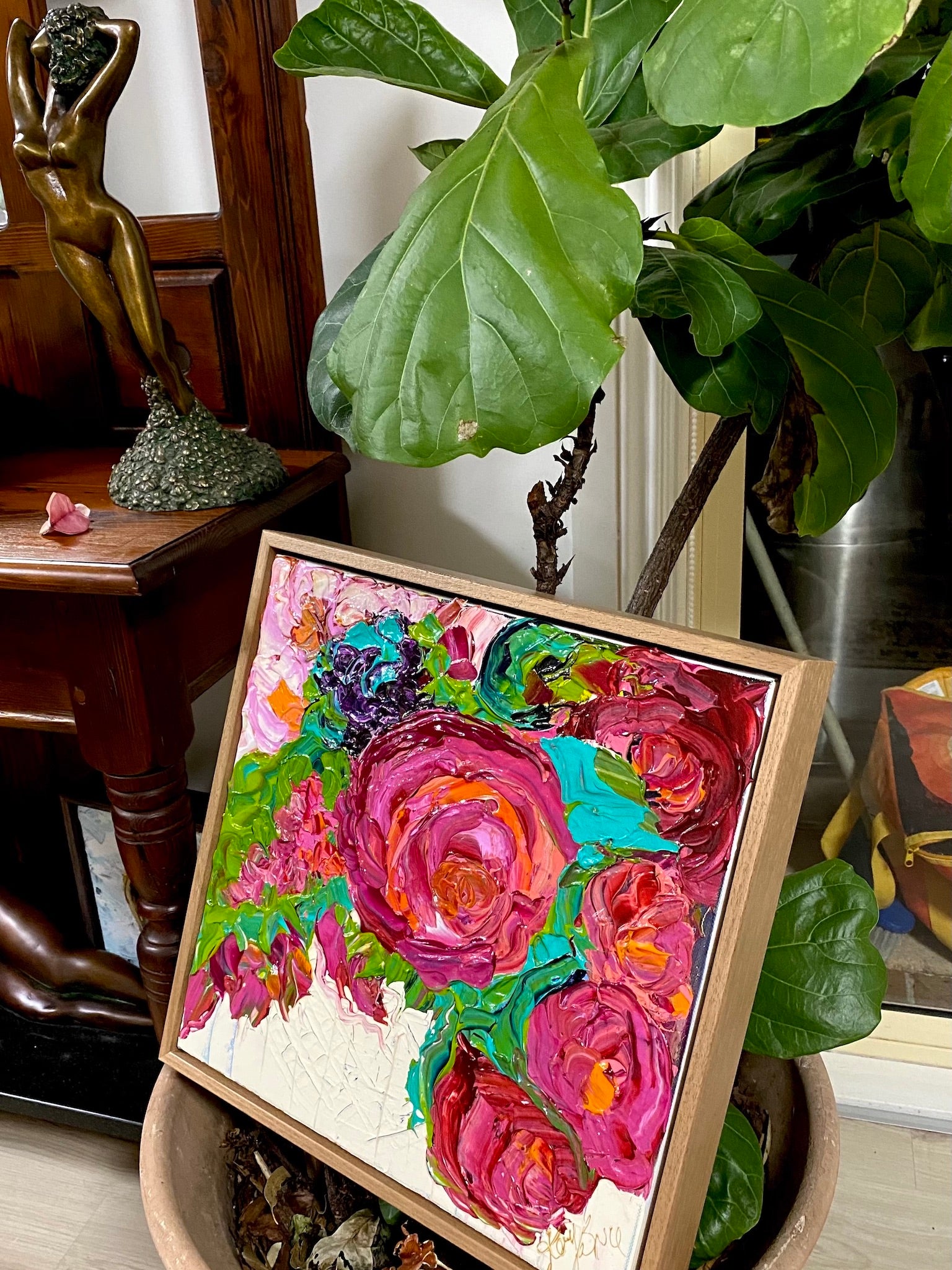 Kerry Bruce Peonies original artwork 40cm x 40cm Acrylic on Canvas in Oak Box Frame displayed in front of plant