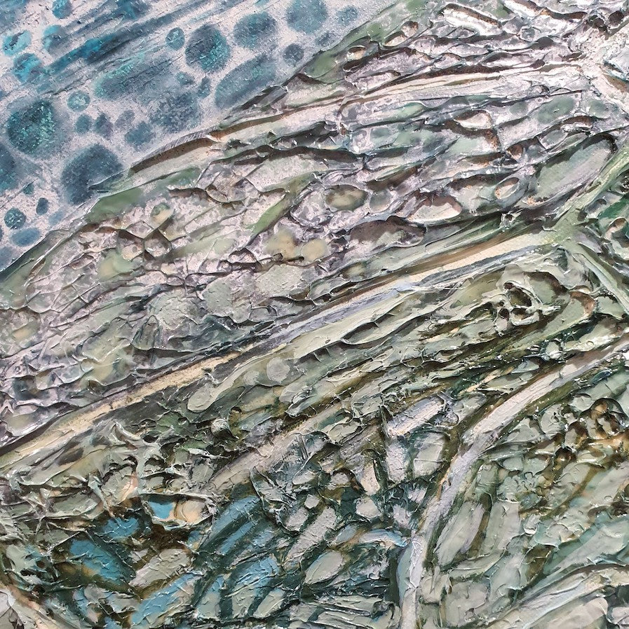 Close detail of a painting of sea turtles.