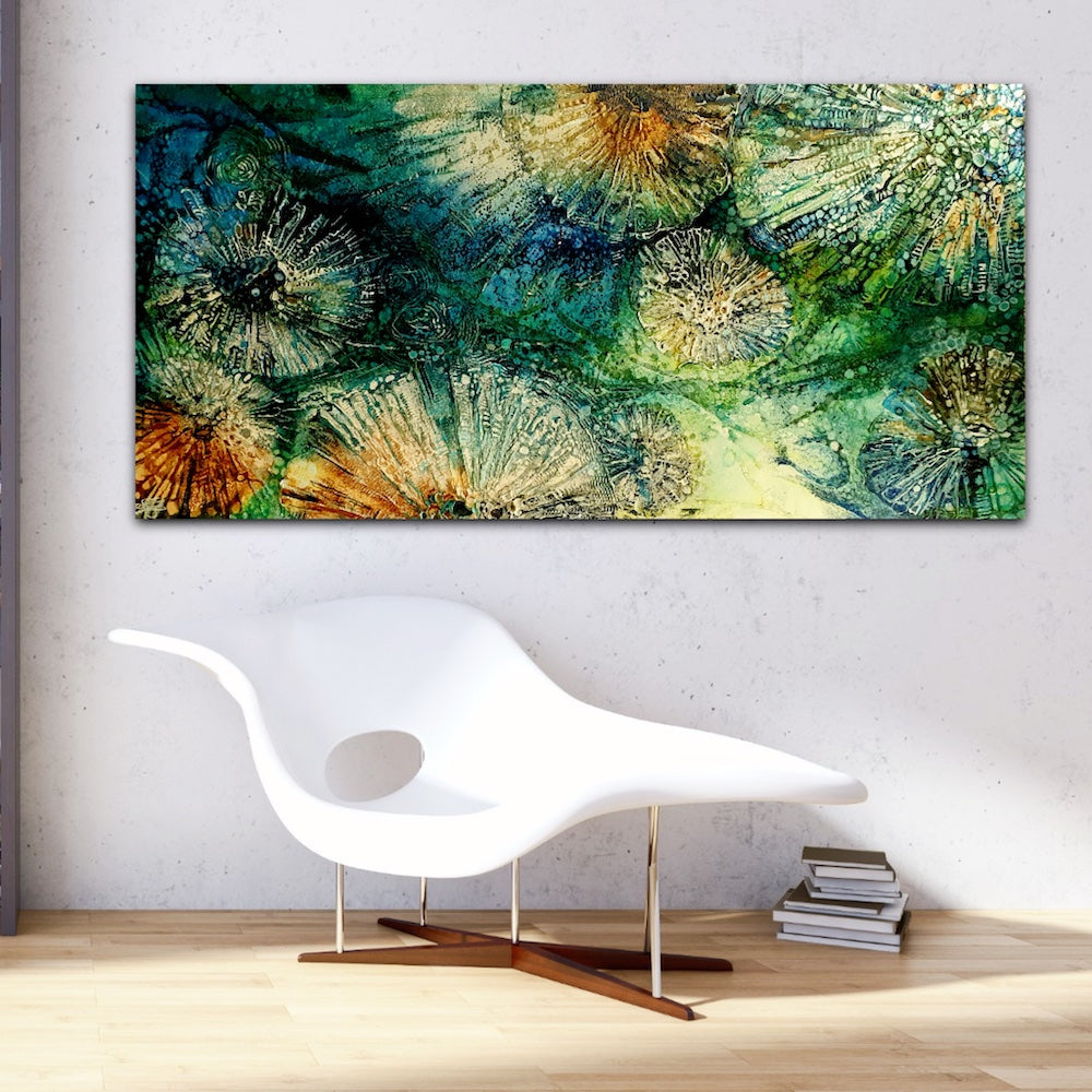 Underwater painting of a creatures in a rock pool in shades of blue, sapphire, aqua, green and turquoise.  In situ on a siting room wall.