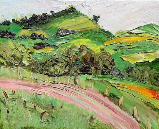 Abstract landscape of rolling green and yellow hills and a winding pink road. 