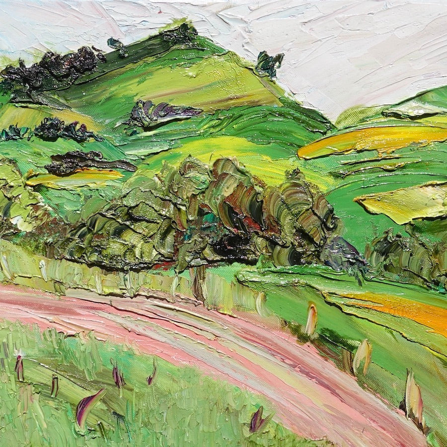 Abstract landscape of rolling green and yellow hills and a winding pink road.  Square view of painting.