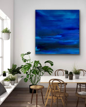 Load image into Gallery viewer, Original abstract artwork in varying shades of deep blue, lighter blue and green. Shown in situ on a white dining room wall.
