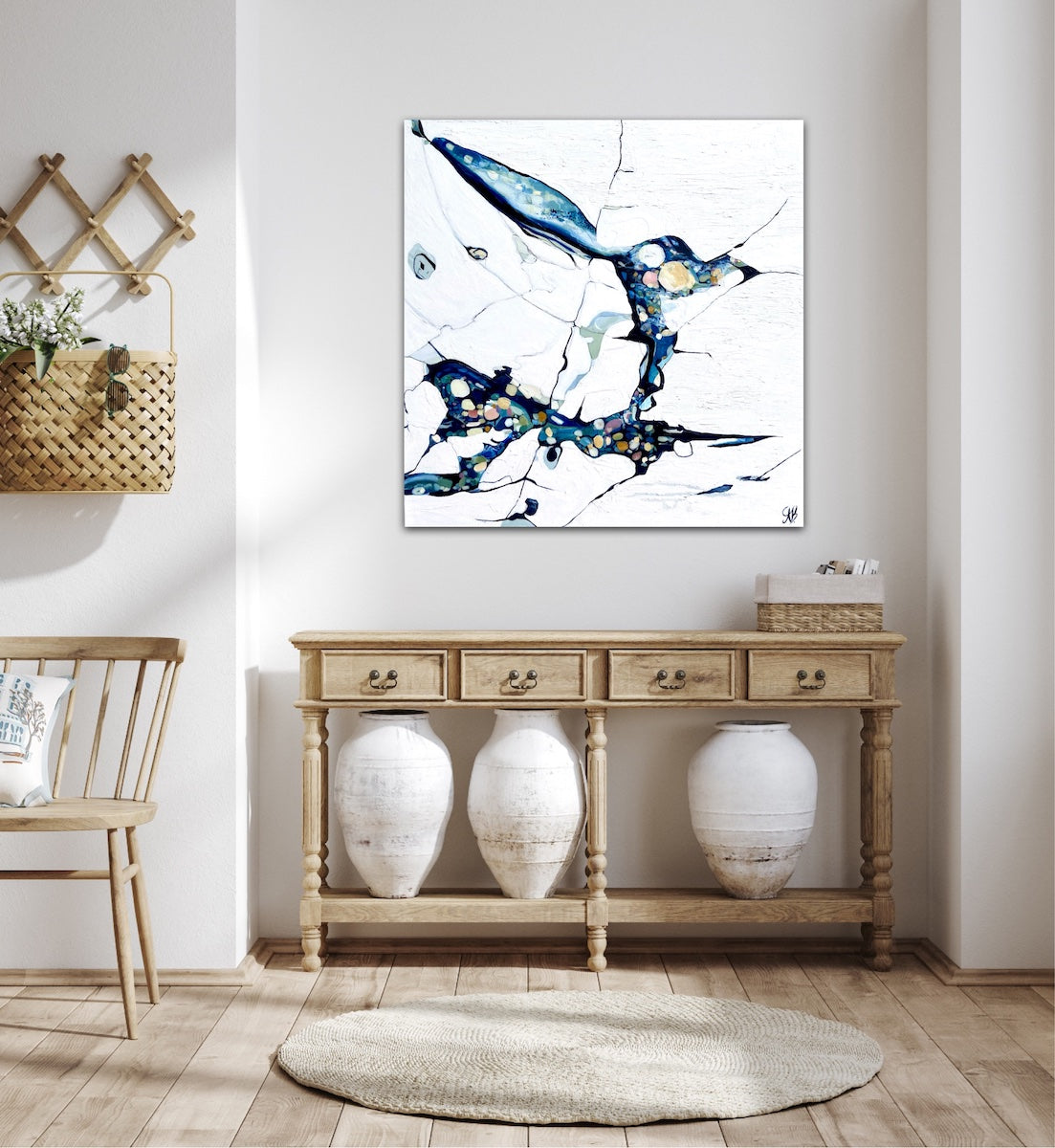 Oil painting of an abstract rock pool in shades of blue, aqua, turquoise with multi-coloured detail. In situ on wall.