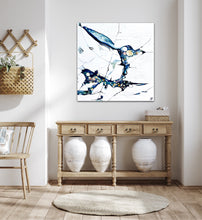 Load image into Gallery viewer, Oil painting of an abstract rock pool in shades of blue, aqua, turquoise with multi-coloured detail. In situ on wall.
