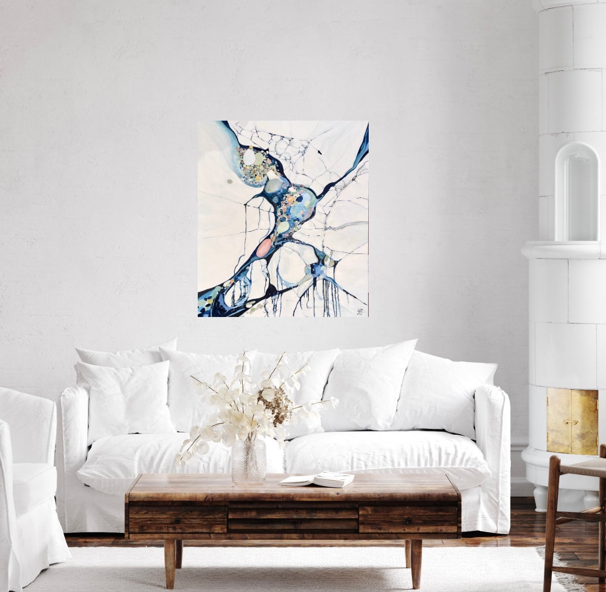 Abstract painting in shades of white, blue and small detail of multi colours. Shown in situ on a white wall.