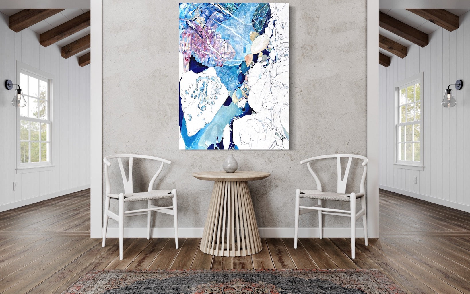 Abstract rockpool in shades of blue, aqua, turquoise, pink, yellow and white. Shown on a wall above a side table and 2 chairs.