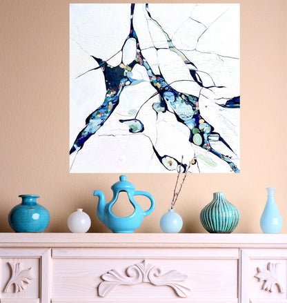 Abstract oil painting on a white background with blue, aqua, turquoise multi-coloured detail. In situ on an apricot coloured wall.